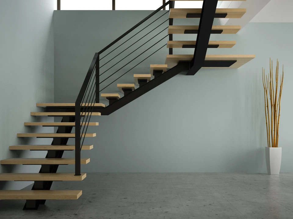 Intérieur moderne minimaliste avec escalier contemporain à structure métallique noire et marches en bois clair